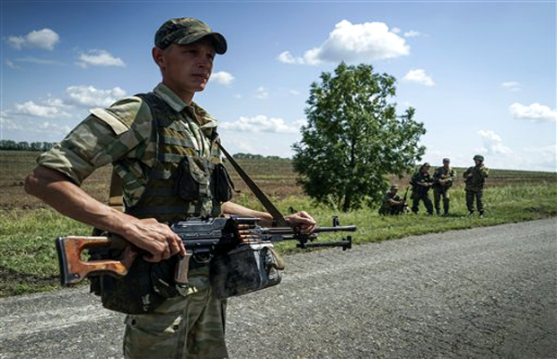 Alexander Zakharchenko, leader of the Donetsk rebels, said Saturday his forces are ready to pull back their tanks and armored vehicles with weapons under 100mm 3 kilometers (1.8 miles) from the front line except in "problem areas," the rebel Donetsk Alexander Zakharchenko, leader of the Donetsk rebels, said Saturday his forces are ready to pull back their tanks and armored vehicles with weapons under 100mm 3 kilometers (1.8 miles) from the front line except in "problem areas," the rebel Donetsk