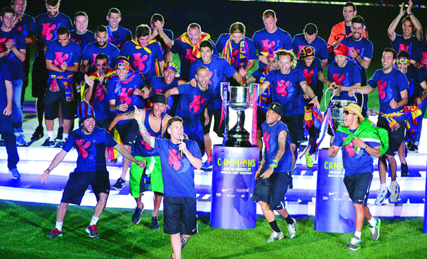 Barcelona players celebrate their Champions League triumph at the Camp Nou stadium in Barcelona on Sunday. (Photo: AFP) Barcelona players celebrate their Champions League triumph at the Camp Nou stadium in Barcelona on Sunday. (Photo: AFP)