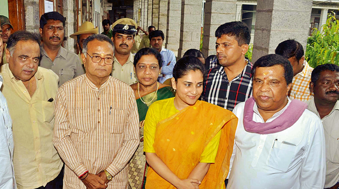 Mandya Congress candidate L.R. Shivarame Gowda with housing minister Ambareesh and party leaders Ramya and M.S. Atmananda at the filing of nomination papers on Wednesday Mandya Congress candidate L.R. Shivarame Gowda with housing minister Ambareesh and party leaders Ramya and M.S. Atmananda at the filing of nomination papers on Wednesday