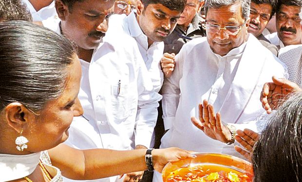 Chief Minister Siddaramaiah at the inauguration of developmental works in Kurubarahalli in Bengaluru on Wednesday. Chief Minister Siddaramaiah at the inauguration of developmental works in Kurubarahalli in Bengaluru on Wednesday.