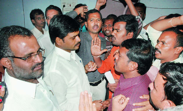 Activists from Sri Krishnadevaraya University Joint Action Committee prevent DCC president and Guntakal MLA Madhusudhan Guptha at Press Club in Anantapur on Friday. -DC Activists from Sri Krishnadevaraya University Joint Action Committee prevent DCC president and Guntakal MLA Madhusudhan Guptha at Press Club in Anantapur on Friday. -DC