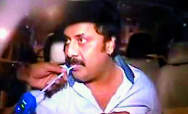 Actor Raja Ravindra taking the breath analyser test on Saturday night in the Banjara Hills area of Hyderabad. He has to appear for a counselling session at the Traffic Training Institute on Monday and will be produced in court on Tuesday. The actor Actor Raja Ravindra taking the breath analyser test on Saturday night in the Banjara Hills area of Hyderabad. He has to appear for a counselling session at the Traffic Training Institute on Monday and will be produced in court on Tuesday. The actor