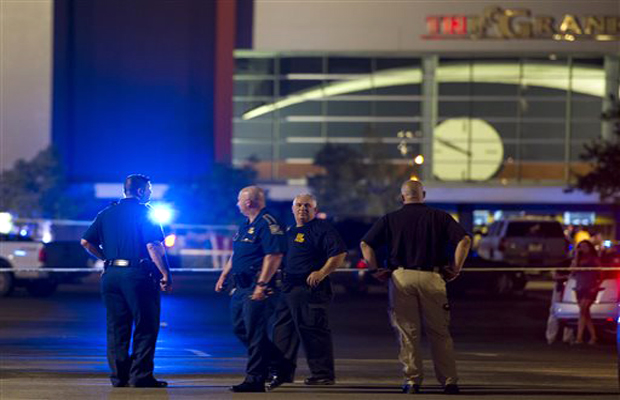 Police tape surrounds the Grand Theatre following a deadly shooting Thursday, July 23, 2015, in Lafayette, La. (Photo: AP) Police tape surrounds the Grand Theatre following a deadly shooting Thursday, July 23, 2015, in Lafayette, La. (Photo: AP)