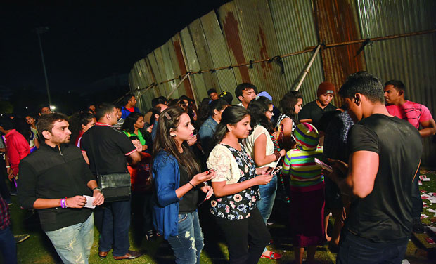 People had to wait for hours in long queues before they were allowed to enter the concert venue People had to wait for hours in long queues before they were allowed to enter the concert venue