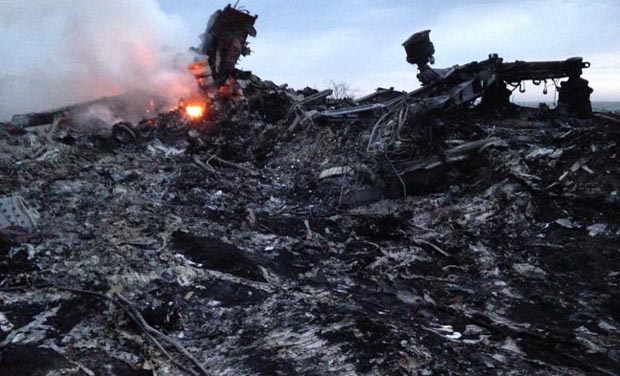 Smoke rises up at a crash site of a passenger plane, near the village of Hrabove, Ukraine. (Photo: AP) Smoke rises up at a crash site of a passenger plane, near the village of Hrabove, Ukraine. (Photo: AP)