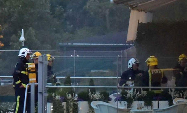 Wimbledon's famed Centre Court was evacuated after the close of play on Wednesday as firemen and police responded to a fire in one of the stadium's plush restaurants. (Photo: AFP) Wimbledon's famed Centre Court was evacuated after the close of play on Wednesday as firemen and police responded to a fire in one of the stadium's plush restaurants. (Photo: AFP)