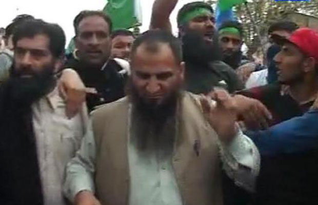 Masarat Alam, released from jail last month, raised pro-Pakistan slogans and others waved Pakistani flags. (Photo: Twitter) Masarat Alam, released from jail last month, raised pro-Pakistan slogans and others waved Pakistani flags. (Photo: Twitter)