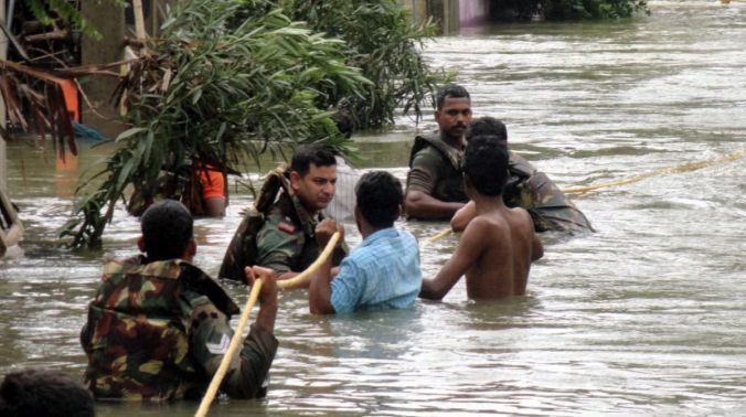 Army personnel using a rope to rescue people in a flooded locality in Chennai (Photo: PTI) Army personnel using a rope to rescue people in a flooded locality in Chennai (Photo: PTI)