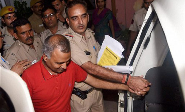 AAP MLA Somnath Bharti being taken into custody after he surrendered at the Dwarka North Police Station in New Delhi. (Photo: PTI) AAP MLA Somnath Bharti being taken into custody after he surrendered at the Dwarka North Police Station in New Delhi. (Photo: PTI)