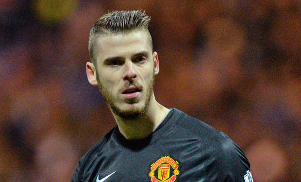 Manchester United goalkeeper David de Gea, who came within minutes of joining Real Madrid last week, signed a new four-year contract with the English Premier League club on Friday. (Photo: AFP) Manchester United goalkeeper David de Gea, who came within minutes of joining Real Madrid last week, signed a new four-year contract with the English Premier League club on Friday. (Photo: AFP)