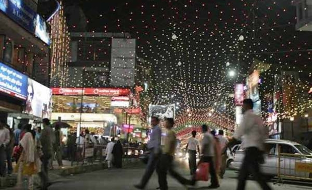Shoppers crowd a market, decorated as part of Diwali celebrations (Photo: Associated Press) Shoppers crowd a market, decorated as part of Diwali celebrations (Photo: Associated Press)