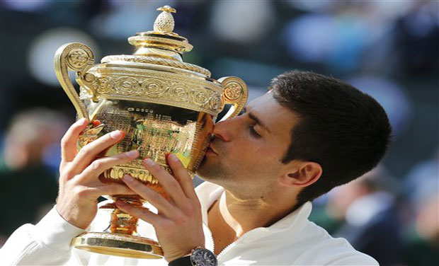 Novak Djokovic beat Federer, as well as his own doubts and demons, 6-7 (7/9), 6-4, 7-6 (7/4), 5-7, 6-4 in a rollercoaster Wimbledon final to add to his 2011 All England Club title and take his majors tally to seven. Photo: AP Novak Djokovic beat Federer, as well as his own doubts and demons, 6-7 (7/9), 6-4, 7-6 (7/4), 5-7, 6-4 in a rollercoaster Wimbledon final to add to his 2011 All England Club title and take his majors tally to seven. Photo: AP