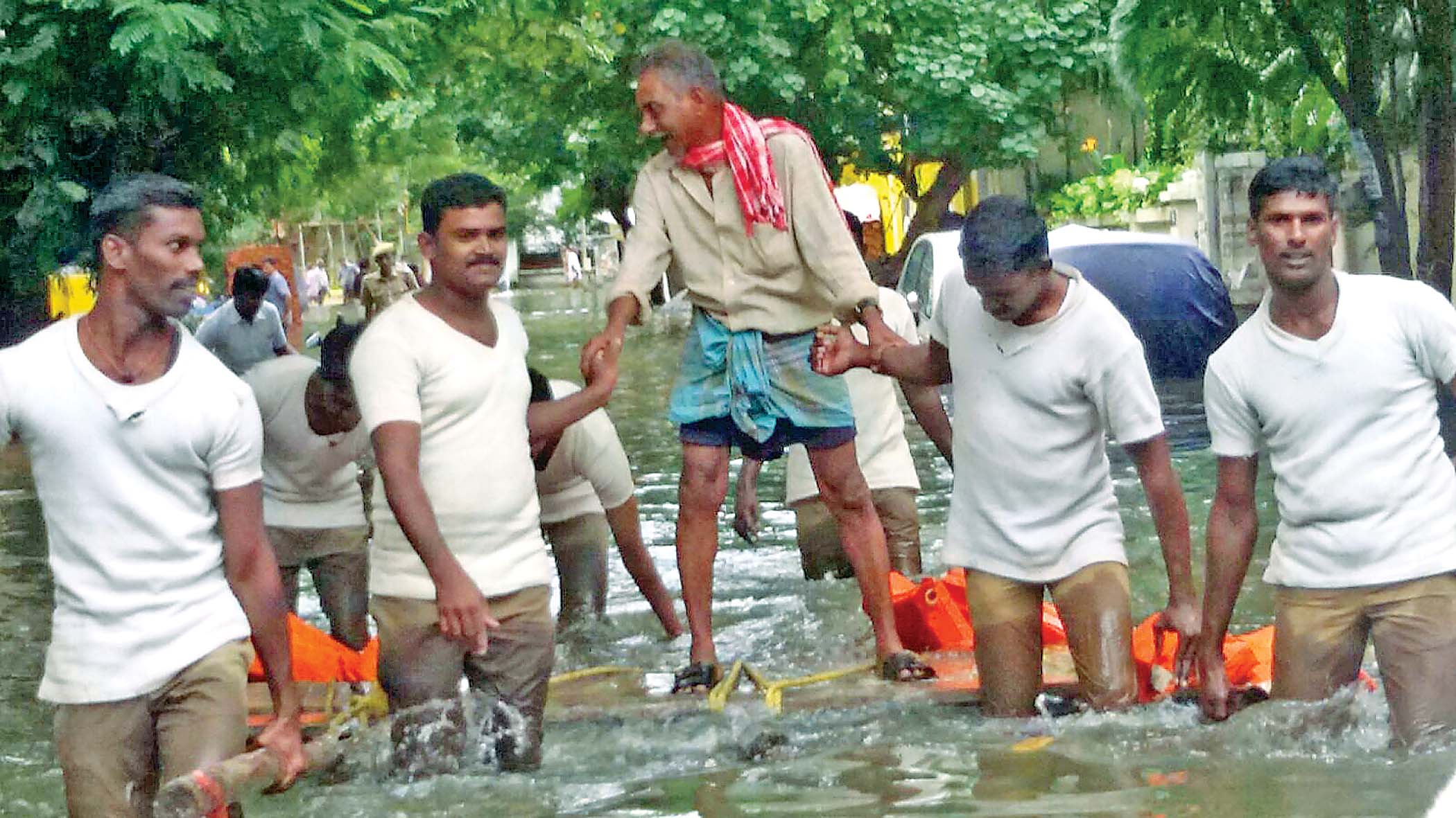 Firemen attending to rescue works in knee-deep water in Villivakkam during recent rains. (Photo: DC) Firemen attending to rescue works in knee-deep water in Villivakkam during recent rains. (Photo: DC)