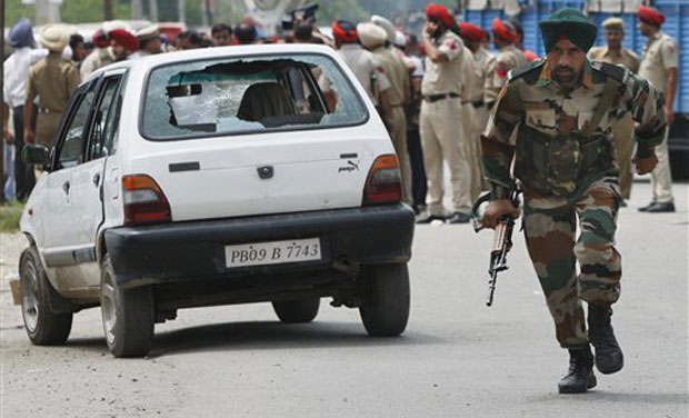 Army was called in from Pathankot and the whole area has been cordoned off. Quick Reaction Teams, bomb squads, police including senior officers have also been deployed in the area, which lies close to the Indo-Pakistan border. (Photo: AP) Army was called in from Pathankot and the whole area has been cordoned off. Quick Reaction Teams, bomb squads, police including senior officers have also been deployed in the area, which lies close to the Indo-Pakistan border. (Photo: AP)