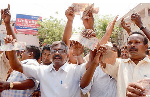 Activists show the notes they allegedly found at a TD polling counter, in Vijayawada (Photo: Deccan Chronicle) Activists show the notes they allegedly found at a TD polling counter, in Vijayawada (Photo: Deccan Chronicle)