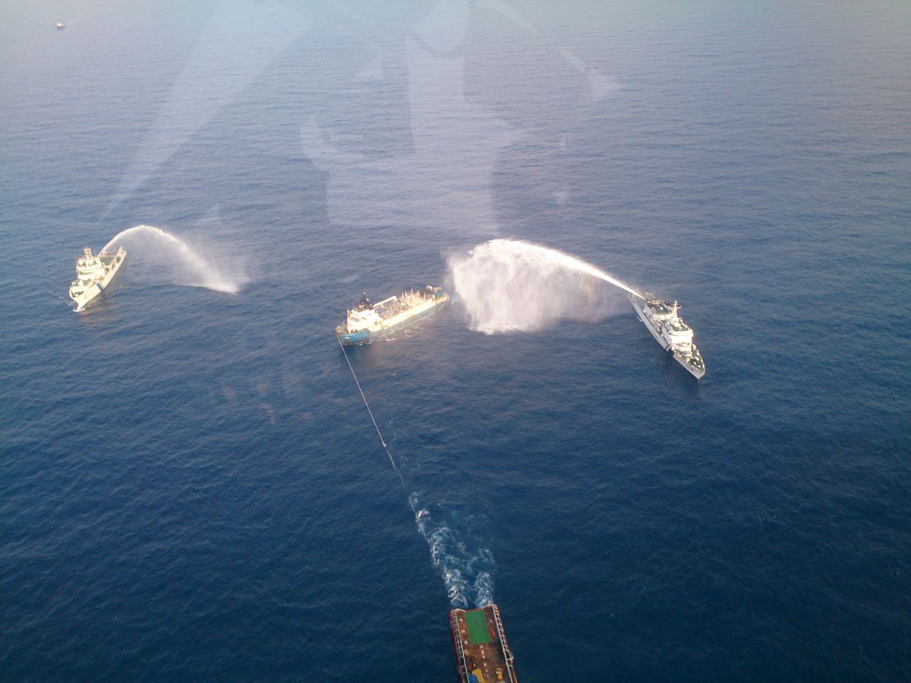 Indian Coast Guard SAR vessels dowsing the fire on-board the dist-rest merchant vessel. (Photo: Indian Coast Guard) Indian Coast Guard SAR vessels dowsing the fire on-board the dist-rest merchant vessel. (Photo: Indian Coast Guard)