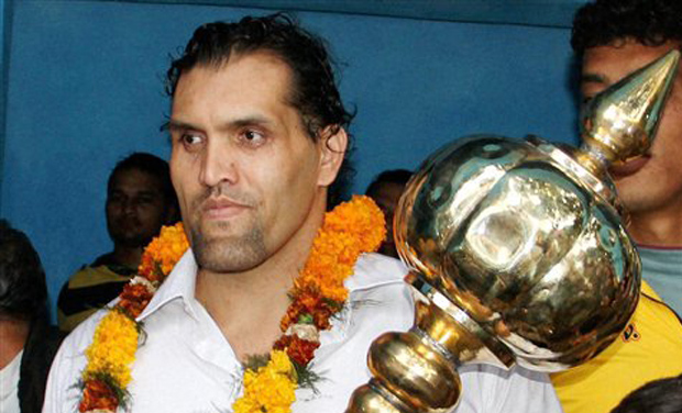 Dalip Singh Rana, The Great Khali holds a mace during District Wrestling Championship in Jammu on Sunday. (Photo: PTI) Dalip Singh Rana, The Great Khali holds a mace during District Wrestling Championship in Jammu on Sunday. (Photo: PTI)