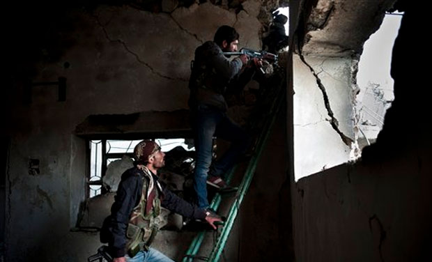 Kurdish fighters take up different positions to lure Islamic State group militants to give their location in Kobani, Syria (Photo: AP) Kurdish fighters take up different positions to lure Islamic State group militants to give their location in Kobani, Syria (Photo: AP)