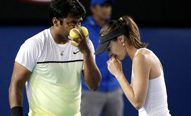 Leander Paes and Martina Hingis in between the sets during the mixed doubles final of Australian Open in Melbourne on Sunday (Photo: AP) Leander Paes and Martina Hingis in between the sets during the mixed doubles final of Australian Open in Melbourne on Sunday (Photo: AP)