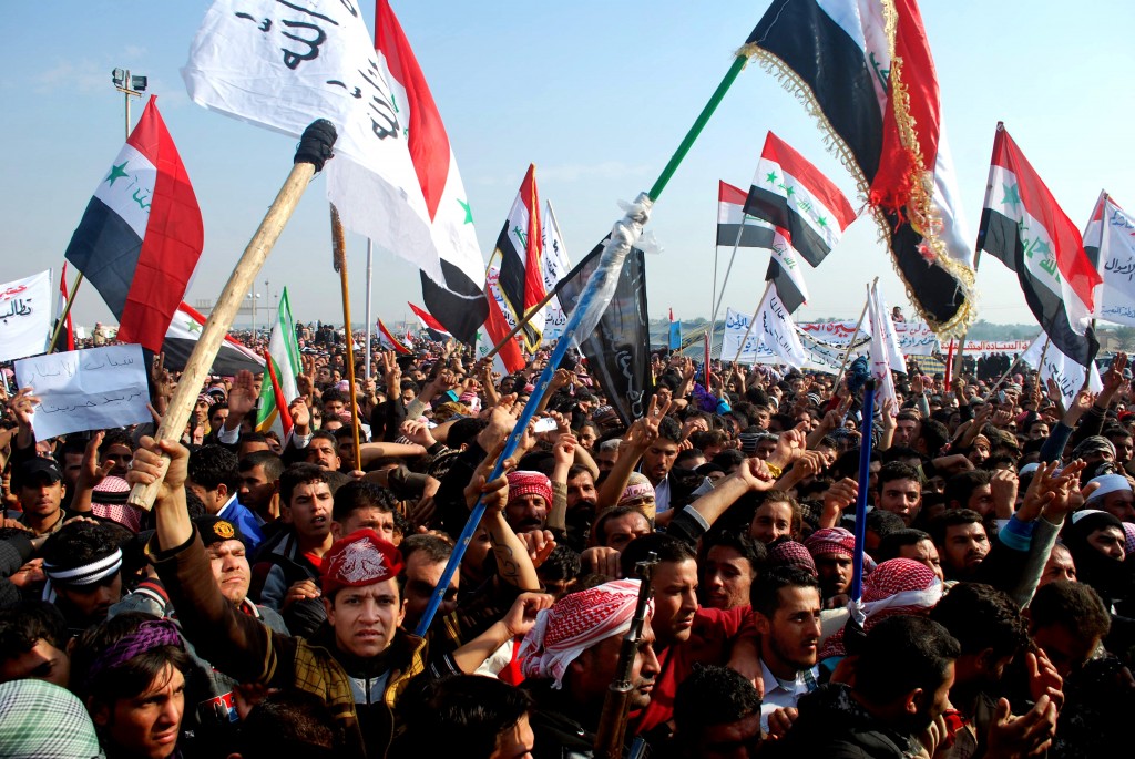 Protesters chant slogans against Iraq's Shiite-led government in Ramadi, 70 miles (115 kilometers) west of Baghdad, Iraq. File Photo- AP
Protesters chant slogans against Iraq's Shiite-led government in Ramadi, 70 miles (115 kilometers) west of Baghdad, Iraq. File Photo- AP 