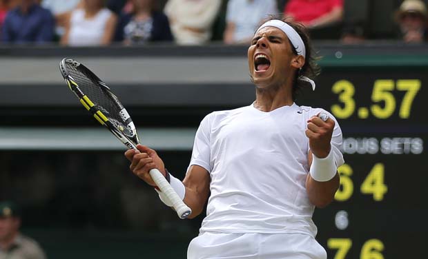 Rafael Nadal of Spain celebrates after he defeated Lukas Rosol of the Czech Republic in their mens singles match on Centre Court at the All England Lawn Tennis Championships in Wimbledon (Photo: AP) Rafael Nadal of Spain celebrates after he defeated Lukas Rosol of the Czech Republic in their mens singles match on Centre Court at the All England Lawn Tennis Championships in Wimbledon (Photo: AP)