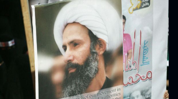 A poster with the image of Shiite cleric Sheik Nimr al-Nimr (Photo: AP/File) A poster with the image of Shiite cleric Sheik Nimr al-Nimr (Photo: AP/File)