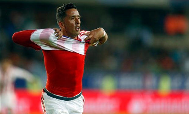 Paraguay's Lucas Barrios celebrates after scoring his team's second goal during the Copa America Group B match against Argentina at La Portada stadium in La Serena, Chile on Saturday. (Photo: AP) Paraguay's Lucas Barrios celebrates after scoring his team's second goal during the Copa America Group B match against Argentina at La Portada stadium in La Serena, Chile on Saturday. (Photo: AP)