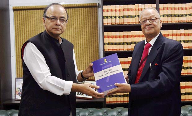 Finance Minister Arun Jaitley receiving the report of Seventh Pay Commission from its Chairman Justice A K Mathur in New Delhi (Photo: PTI) Finance Minister Arun Jaitley receiving the report of Seventh Pay Commission from its Chairman Justice A K Mathur in New Delhi (Photo: PTI)