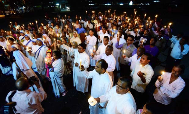Christian community members of Bhopal Archdiocese taking out a candle light vigil in solidarity with the victims of terrorism in Paris and Mali. (Photo: PTI) Christian community members of Bhopal Archdiocese taking out a candle light vigil in solidarity with the victims of terrorism in Paris and Mali. (Photo: PTI)