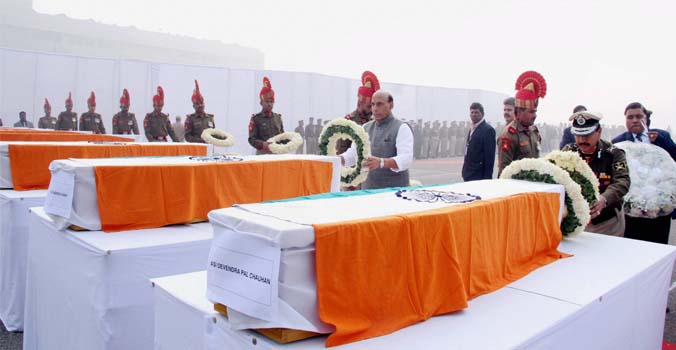 Union Home Minister Rajnath Singh paying homage to the BSF plane crash victims during a wreath laying ceremony at Safdarjung airport in New Delhi (Photo: PTI) Union Home Minister Rajnath Singh paying homage to the BSF plane crash victims during a wreath laying ceremony at Safdarjung airport in New Delhi (Photo: PTI)