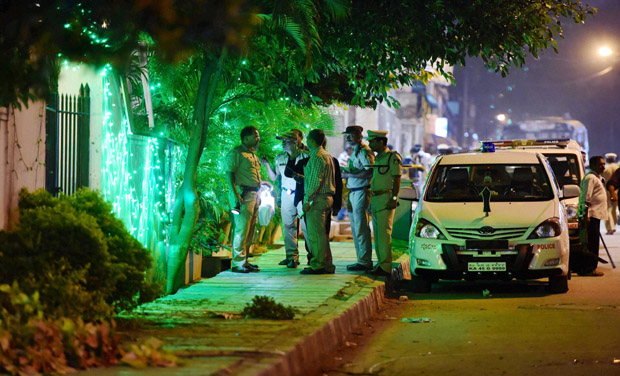 Police officials on spot where a low intensity bomb blast occurred at church street in Bengaluru (Photo: PTI) Police officials on spot where a low intensity bomb blast occurred at church street in Bengaluru (Photo: PTI)