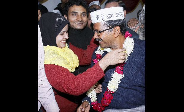 Aam Aadmi Party convener Arvind Kejriwal being garlanded by a party worker after he was elected unanimously by 28 legislators of the Aam Aadmi Party as their leader in the Delhi Assembly, in New Delhi on Monday. PTI Aam Aadmi Party convener Arvind Kejriwal being garlanded by a party worker after he was elected unanimously by 28 legislators of the Aam Aadmi Party as their leader in the Delhi Assembly, in New Delhi on Monday. PTI