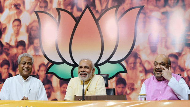 Prime Minister Narendra Modi interacts with BJP central office bearers on the occasion of the first anniversary of his government, at the party headquarters in New Delhi (Photo: PTI) Prime Minister Narendra Modi interacts with BJP central office bearers on the occasion of the first anniversary of his government, at the party headquarters in New Delhi (Photo: PTI)