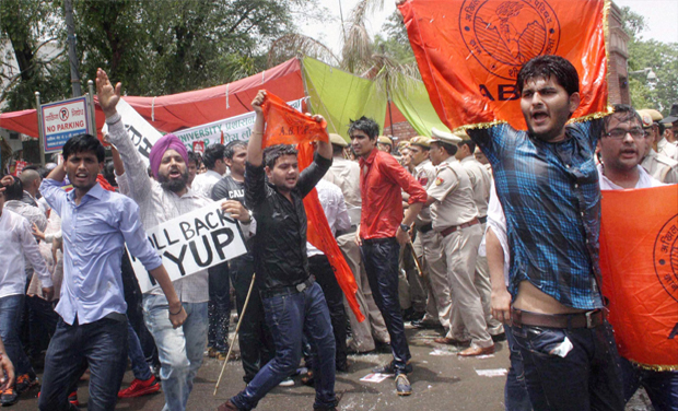 ABVP activists protest against the four-year undergraduate programme (FYUP) of Delhi University in New Delhi (Photo: PTI) ABVP activists protest against the four-year undergraduate programme (FYUP) of Delhi University in New Delhi (Photo: PTI)
