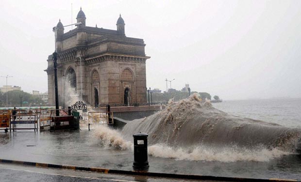 A view of Gateway of India during the high tide due to continue rain in Mumbai (Photo: PTI) A view of Gateway of India during the high tide due to continue rain in Mumbai (Photo: PTI)