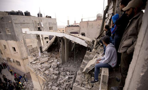 Palestinians look at a house that was demolished by the Israeli army, in the Qalandia refugee camp on the outskirts of the West Bank city of Ramallah (Photo: AP) Palestinians look at a house that was demolished by the Israeli army, in the Qalandia refugee camp on the outskirts of the West Bank city of Ramallah (Photo: AP)