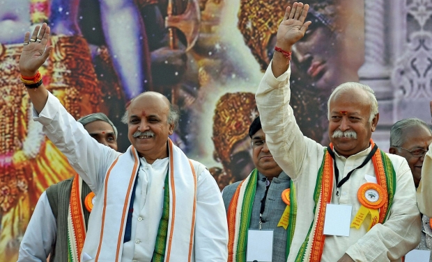 RSS (Rashtriya Swayamsevak Sangh) chief Mohan Bhagwat and VHP Working President Praveen Togadia during Virat Hindu Sammelan, organised by VHP as a part of its Golden Jubilee Celebrations at Shahid Minar maidan in Kolkata on Saturday (Photo: PTI) RSS (Rashtriya Swayamsevak Sangh) chief Mohan Bhagwat and VHP Working President Praveen Togadia during Virat Hindu Sammelan, organised by VHP as a part of its Golden Jubilee Celebrations at Shahid Minar maidan in Kolkata on Saturday (Photo: PTI)