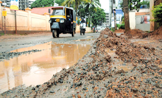 Pothole riddled road leading to Infopark.(Photo: DC) Pothole riddled road leading to Infopark.(Photo: DC)