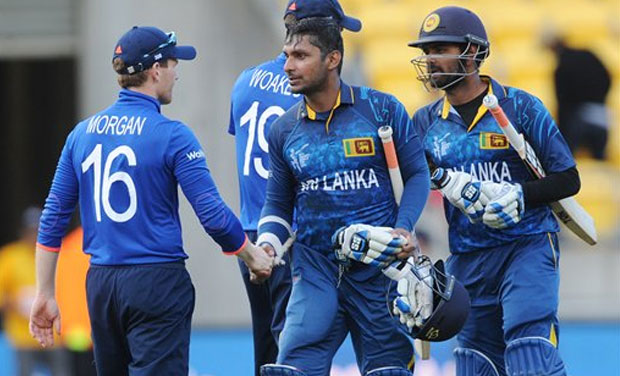 Sri Lanka batsman Kumar Sangakkara shakes hands with England captain Eoin Morgan after the match in Wellington on Sunday. (Photo: AP) Sri Lanka batsman Kumar Sangakkara shakes hands with England captain Eoin Morgan after the match in Wellington on Sunday. (Photo: AP)