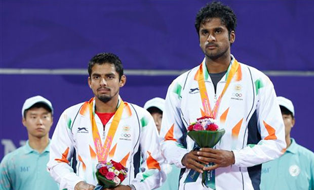 Sanam Singh and Saketh Myneni settled for a silver at the Asian Games in Incheon after losing the final against Korea's Yongkyu Lim and Hyeon Chung. Photo: AP Sanam Singh and Saketh Myneni settled for a silver at the Asian Games in Incheon after losing the final against Korea's Yongkyu Lim and Hyeon Chung. Photo: AP