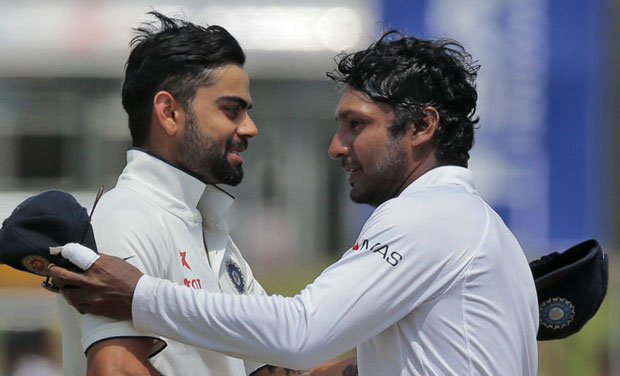 Team India, led by Kohli gave Sangakkara a guard of honour when he came out to bat amidst a thunderous applause from fans at the P Sara Oval. (Photo: AP) Team India, led by Kohli gave Sangakkara a guard of honour when he came out to bat amidst a thunderous applause from fans at the P Sara Oval. (Photo: AP)