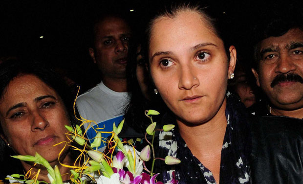 Indian tennis star Sania Mirza after her arrival in Hyderabad on Tuesday. (Photo: AP/PTI) Indian tennis star Sania Mirza after her arrival in Hyderabad on Tuesday. (Photo: AP/PTI)