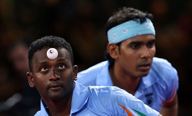 Achanta Sharath Kamal and Anthony Amalraj won a silver medal for India in men's doubles table tennis at the Commonwealth Games 2014 in Glasgow. Photo: AP Achanta Sharath Kamal and Anthony Amalraj won a silver medal for India in men's doubles table tennis at the Commonwealth Games 2014 in Glasgow. Photo: AP