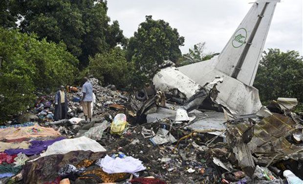 Police and rescue workers recovered the bodies of 36 men, women and children among the wreckage of the An-12 cargo plane, which crashed into a farming community on an island in the White Nile river, seconds after departure. (Photo: AP) Police and rescue workers recovered the bodies of 36 men, women and children among the wreckage of the An-12 cargo plane, which crashed into a farming community on an island in the White Nile river, seconds after departure. (Photo: AP)