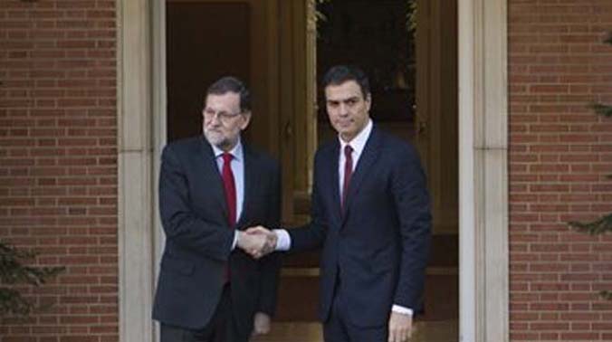 Spanish Prime Minister Mariano Rajoy met with Pablo Iglesias on Monday morning, leader of the far-left Podemos party. (Photo: AP) Spanish Prime Minister Mariano Rajoy met with Pablo Iglesias on Monday morning, leader of the far-left Podemos party. (Photo: AP)
