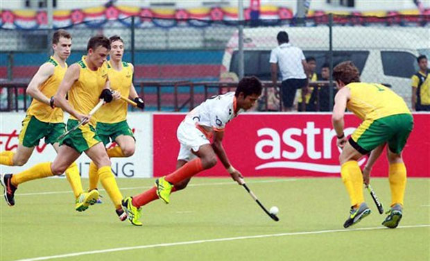 An Indian U-21 hockey player takes a shot during the match as India defeated Australia in the 4th Sultan of Johor Cup in Kuala Lumpur An Indian U-21 hockey player takes a shot during the match as India defeated Australia in the 4th Sultan of Johor Cup in Kuala Lumpur