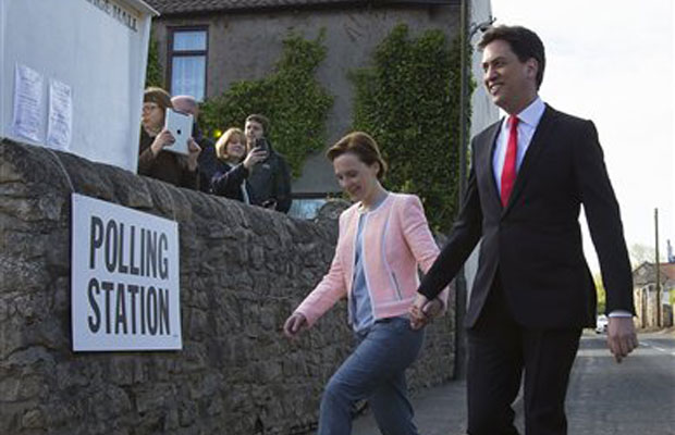 Labour Party leader Ed Miliband and his wife Justine arrive at the polling station before voting at Sutton Village Hall, Doncaster, England. (Photo: AP) Labour Party leader Ed Miliband and his wife Justine arrive at the polling station before voting at Sutton Village Hall, Doncaster, England. (Photo: AP)