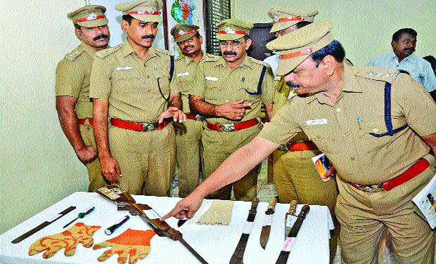 Coimbatore district police team and superintendent of police M. Sudhakar display the seized weapons. (Photo: DC/File) Coimbatore district police team and superintendent of police M. Sudhakar display the seized weapons. (Photo: DC/File)