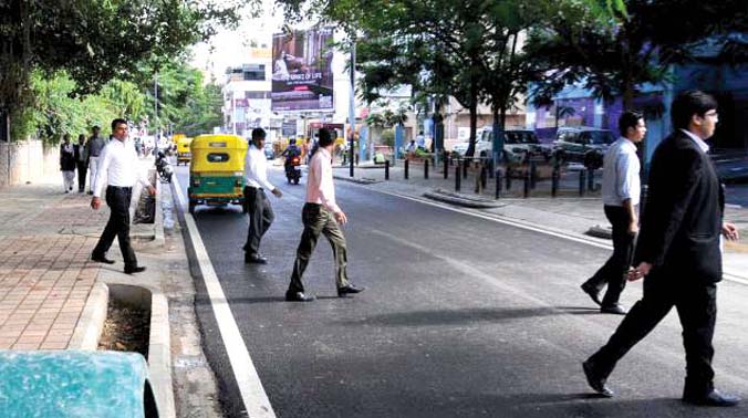 'If roads are to be designed around pedestrians and cyclists, something has to give and in this case, it is the width of the vehicle lanes' 'If roads are to be designed around pedestrians and cyclists, something has to give and in this case, it is the width of the vehicle lanes'