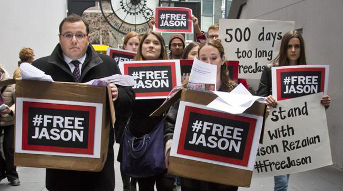 Ali Rezaian, far left, the brother of Washington Post reporter Jason Rezaian, rallies with supporters to deliver a petition of 500,000 signatures to Iran's United Nations mission asking for the release of his brother from prison. (Photo: AP) Ali Rezaian, far left, the brother of Washington Post reporter Jason Rezaian, rallies with supporters to deliver a petition of 500,000 signatures to Iran's United Nations mission asking for the release of his brother from prison. (Photo: AP)
